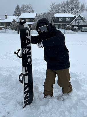 Adult with a snowboard